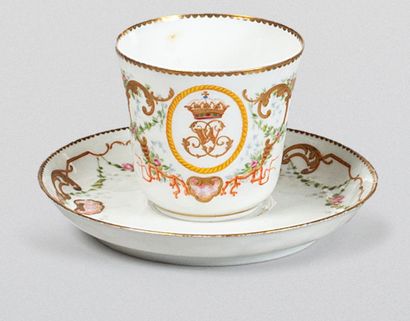 null COFFEE CUP AND ITS PORCELAIN SAUCER. 

Centrally decorated with an oval medallion...