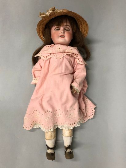 null French doll, with bisque head, closed mouth, damaged and restored, marked "R.D"...