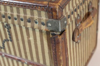 null Doll's travel trunk, wooden case covered with striped fabric, leather side handles,...