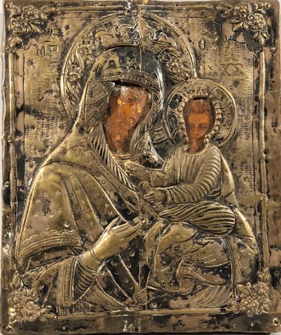 null VIRGIN ICON TO THE CHILD.

Tempera on wood. Oklad in embossed and engraved silver...