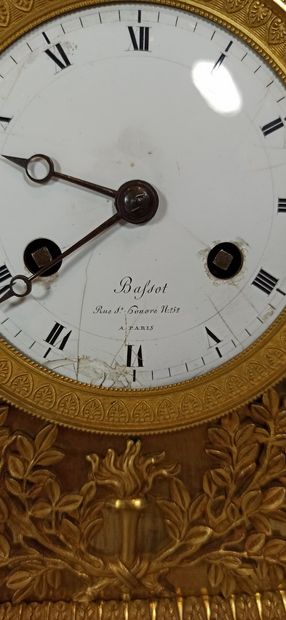 null Bronze clock allegory of music, white enamelled dial signed Bafsot, restoration...