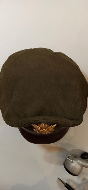 null American pilot set: a brown wool officer's cap with gold metal eagle emblem,...