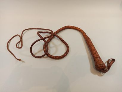 Leather whip.