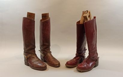Two pairs of burgundy leather boots with...