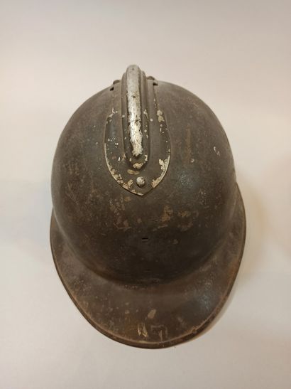 null Two Adrian Model 26 helmets. One complete with Infantry insignia, chinstrap...