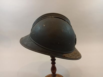 null Pilot Badge

Bronze

N°13542



An ADRIAN helmet Model 1915, horizon blue, with...