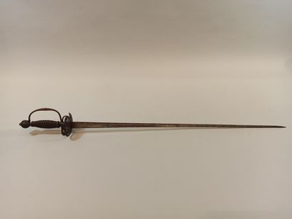 null City sword. 

Iron hilt with a guard branch and an openwork bivalve shell decorated...