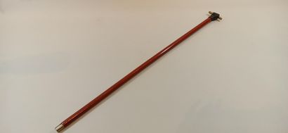  Cane, pommel decorated with a closed hand holding a stick, 
Length: 84 cm