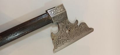 null Miner's axe engraved with etching carried during ceremonies, 19th century.

Length:...