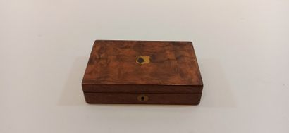 null Wooden box with compartments lined with blue felt, whose lid bears the mark...