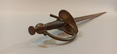 null Officer's sword.

Single-branch guard and rounded bivalve shell. Thumb grip...