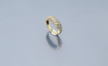 null 18k (750) yellow gold gadrooned ring set with small diamonds. 

Finger size...