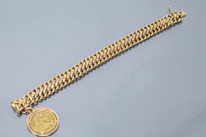 Bracelet or jaune 18k (750) orné d'une pièce...