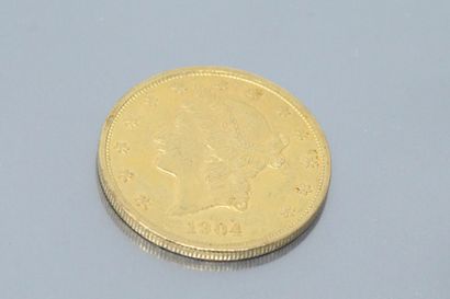 null Pièce en or de 20 dollars "Liberty Head - Double Eagle" avec devise 1904.

Poids...