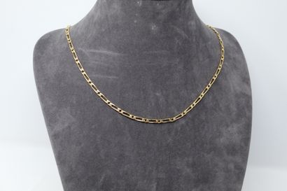 18k (750) yellow gold horse chain. 
Neck...