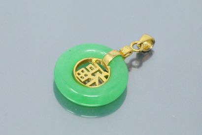 null Pendant decorated with a golden metal ideogram and decorated with a jadeite...