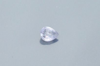 null Lavender pear sapphire on paper.

Probably unheated.

Weight: 3.29 cts