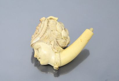 null Sculpted sea foam pipe head showing the bust of a woman with her hair tied in...