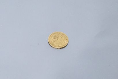  Pièce en or de 20 francs Napoléon III tête laurée 1868 A (atelier Paris). 
 
Poids...