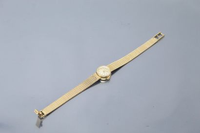 null Ladies' wristwatch, round case in 18k (750) yellow gold, cream dial and stick...