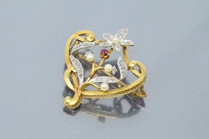 null Openwork brooch in 18k (750) yellow and white gold stylizing a flower paved...