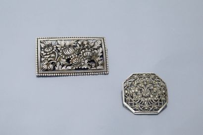 null Two openwork silver brooches:

- one rectangular (Crab) with a flower decoration....