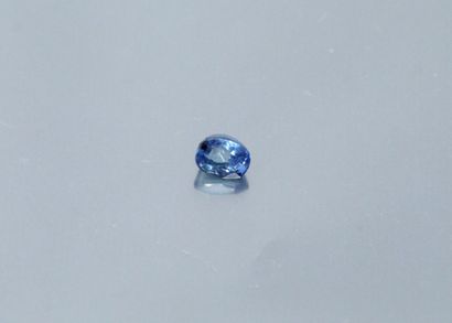 null Oval sapphire on paper.

Unheated Ceylon. 

Weight: approx. 2.20 cts.