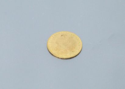 null Gold coin of 10 francs au Coq. (1910). 

Weight: 3.22 g.