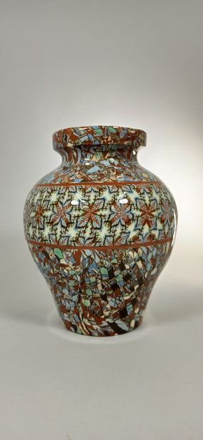 null GERBINO Jean (1876-1966),

Pansu vase with stylized flower decoration

Clay...