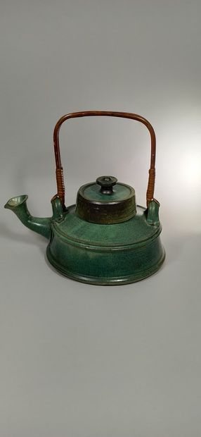 null MARAIS Jean, 1913-1998,

Teapot,blue-green nuanced glazed ceramic teapot with...