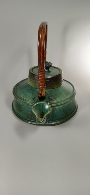 null MARAIS Jean, 1913-1998,

Teapot,blue-green nuanced glazed ceramic teapot with...