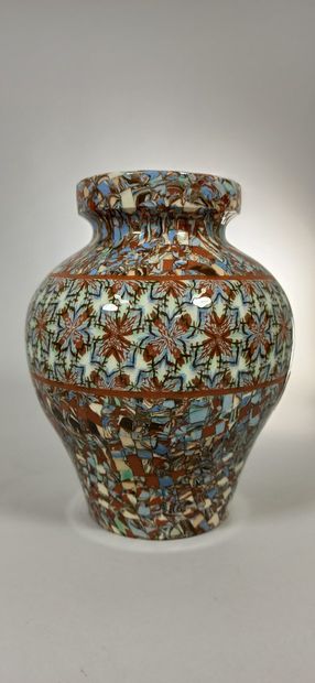 null GERBINO Jean (1876-1966),

Pansu vase with stylized flower decoration

Clay...
