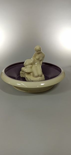 null 
ROOKWOOD





Glazed earthenware centerpiece composed of a white glazed stoneware...