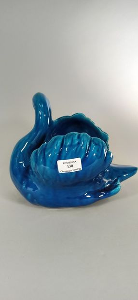 null MAUNIER Alain (20th century)

Turquoise swan sculpture.

White earth, stamped...