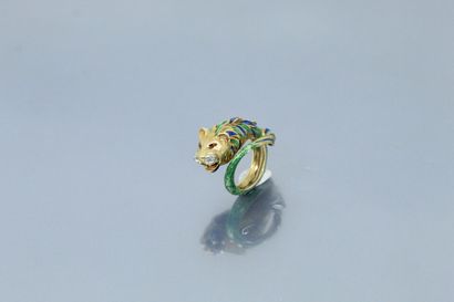  A cast, chased and partially enamelled 18K (750) gold "roaring lion" ring, the nostrils...