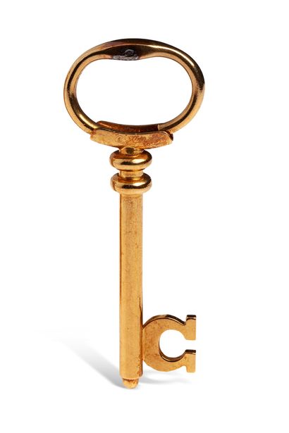 Must of CARTIER 
Key pendant in 18K (750)...