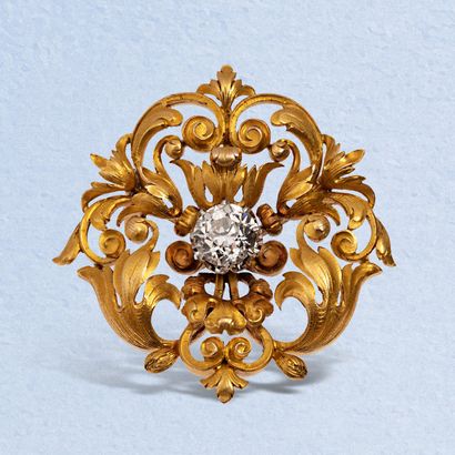 An 18K (750) yellow gold brooch with openwork...