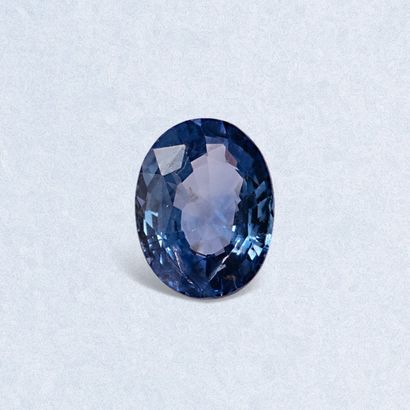 Oval sapphire on paper. 
Accompanied by an...