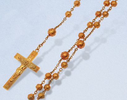 null 18K (750) gold rosary, the chain with forçat link punctuated with balls and...