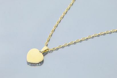 null 18K (750) yellow gold heart pendant set with brilliant-cut diamonds, accompanied...
