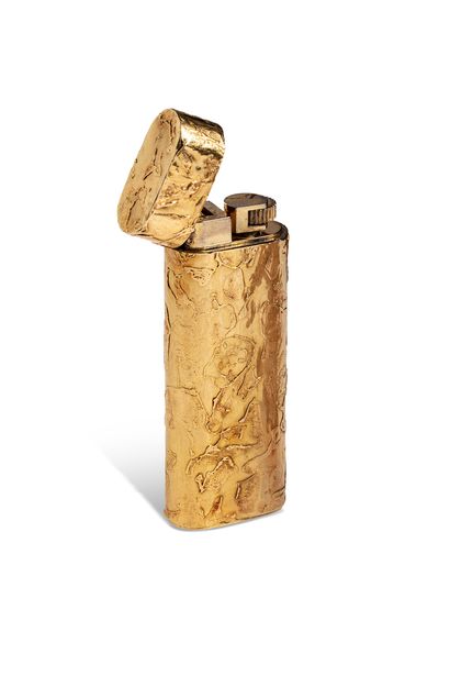 null CARTIER 

Textured 18K (750) gold lighter, probably using the samorodok technique.

Signed...