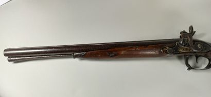 null Saddle rifle. 

Flintlock locks converted to percussion. Double barrel in table,...