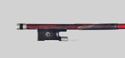 null French violin bow. BAZIN workshop, circa 1920-1930.

Round stick in red-brown...