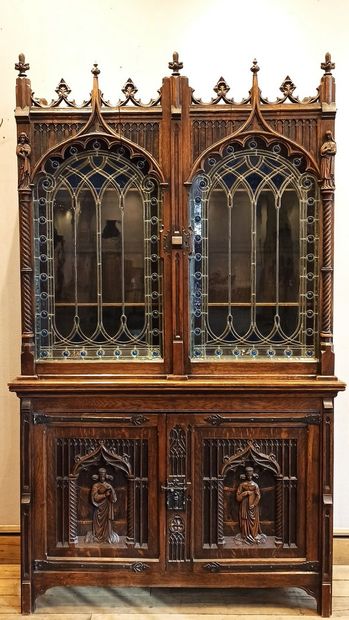 null 
Two neo-Gothic carved wood bodies opening in the lower part with two carved...