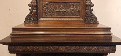 null 
Dresser in natural wood carved in the lower part of a decoration of scrolls,...