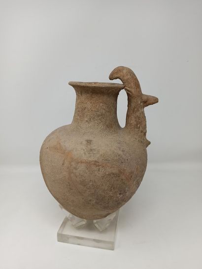 null Jug with ovoid body, neck and handle in the shape of an ibex

Beige and ochre...