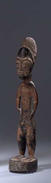 null Baule statuette (Ivory Coast) 

Small female statuette, arms along the body.

Nice...
