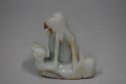 null CHINE - XXe siècle

Groupe en jadéite sculptée de guanyin assise sur le rocher....