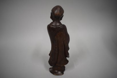 null CHINA - Early 20th century

Statuette of Luohan standing in carved wood, the...