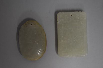 null CHINA

Three celadon nephrite pendants, one in the form of a pebble carved with...